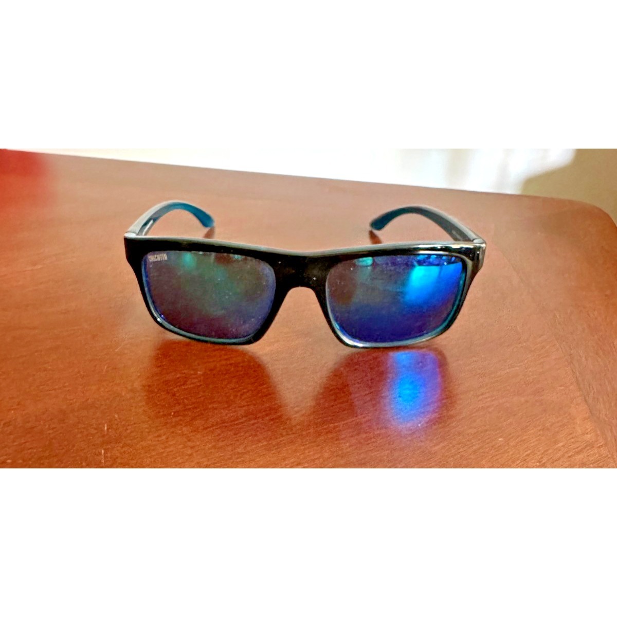Calcutta Polarized Riptide 1220 Black/Blue W Blue Mirror Lens Fishing Sunglasses